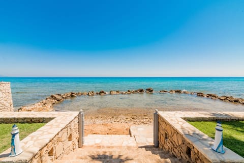 On the beach, sun loungers, beach towels