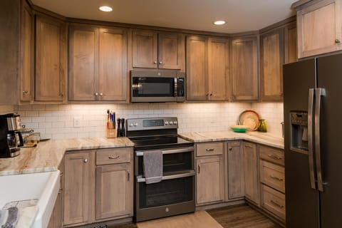 Large pantry, all new appliances, every cooking accessory you might need (instant pot, coffee maker, keurig, kettle, etc.)