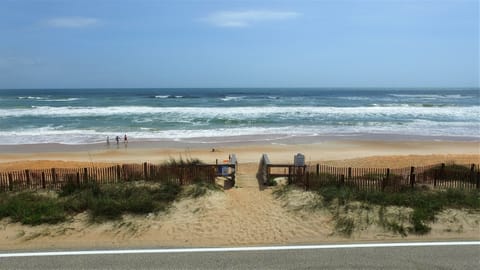 On the beach, sun loungers, beach towels