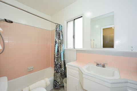 Combined shower/tub, hair dryer, towels, soap