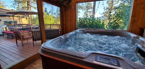 Soak in your indoor / outdoor Private HOT TUB.