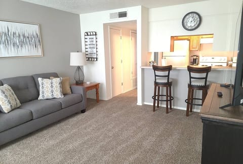 Open space in living room area, smart television included