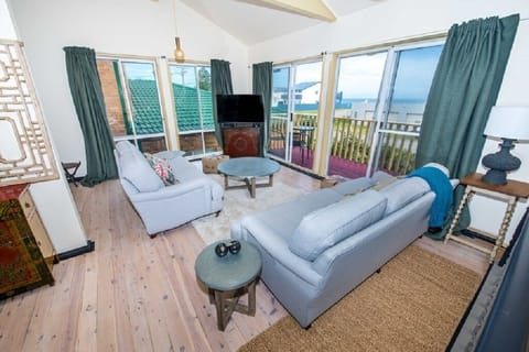 Lounge room overlooking front balcony.