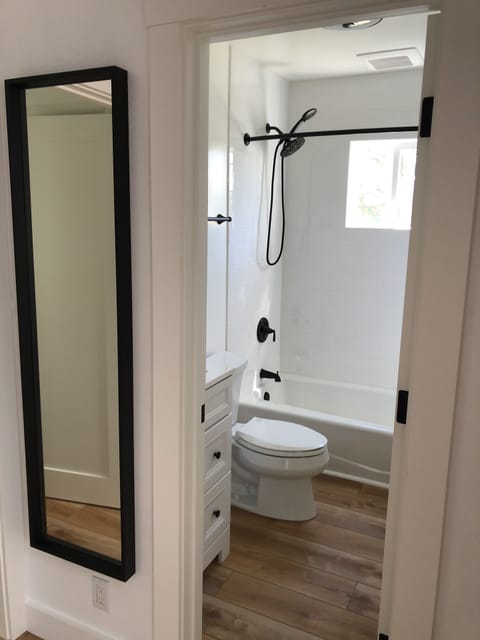 Full-length mirror just outside bathroom