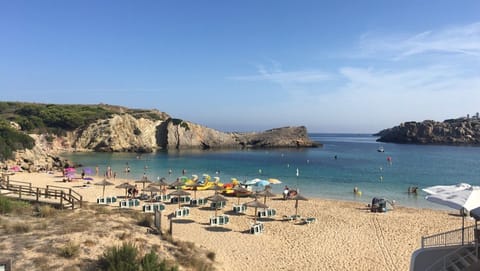 On the beach, sun loungers