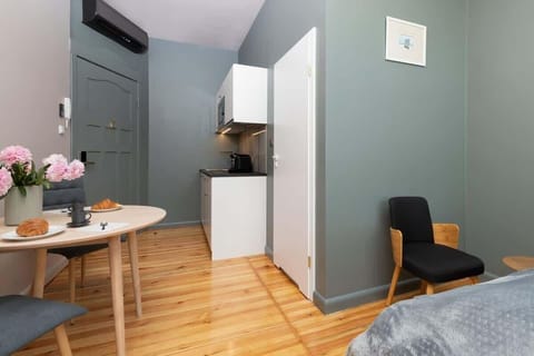 The living area's minimalist design ensures a friendly environment.