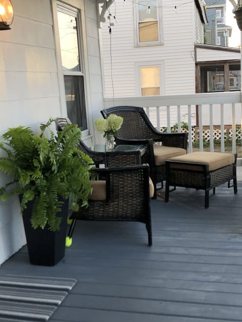 The front porch has comfortable chairs.