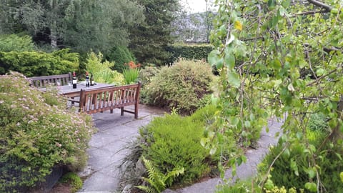 Patio with outside dining table and benches