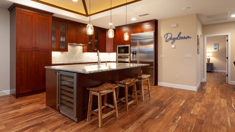 Stocked with cookware, BBQ utensils, spices, oils, vinegars, starter pack Kona coffee and popcorn!