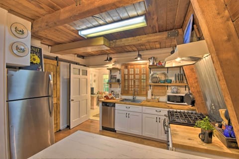This kitchen features stainless steel appliances and cooking basics.