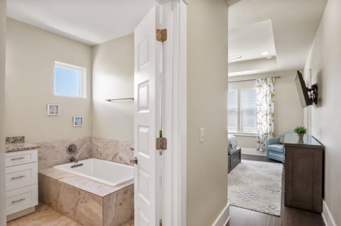 Combined shower/tub, hair dryer, towels, soap