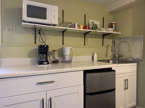 Fridge, microwave, stovetop, coffee/tea maker