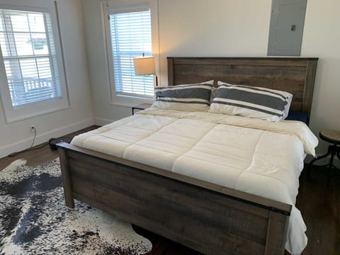 Comforting natural light awakens you in the master bedroom, outfitted with a comfy king-sized bed. Clean and fresh bed and bath linens are all part of your stay!