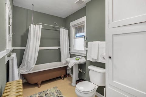 Combined shower/tub, hair dryer, towels, soap