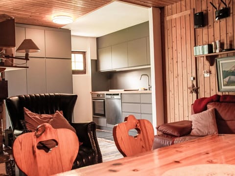 Furniture, Interior Design, Wood, Flooring, Ceiling, Floor, Light Fixture, Room, Lighting, Home