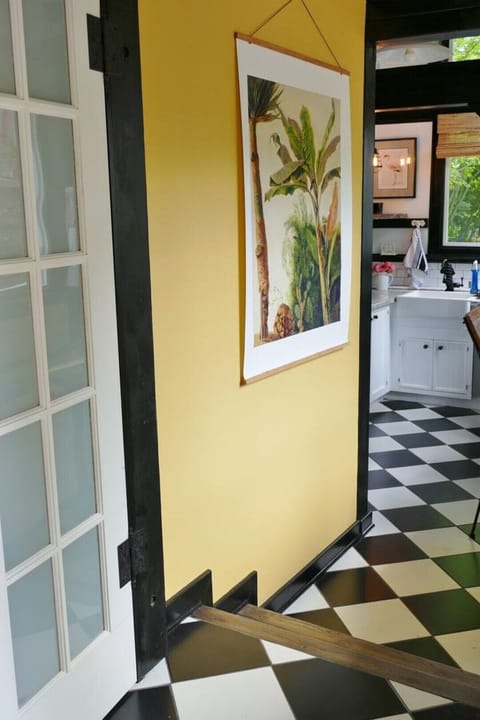 Bathroom door - hallway heading to kitchen.