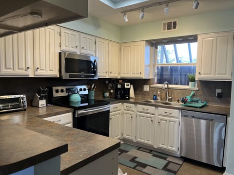 Kitchen with coffee/ tea station, fully equipped