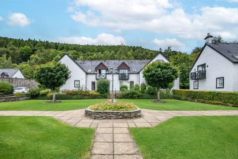 Manicured lawns and quaint cottages offer a picturesque village feel for your stay.