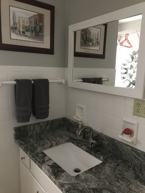 Combined shower/tub, hair dryer, towels, soap