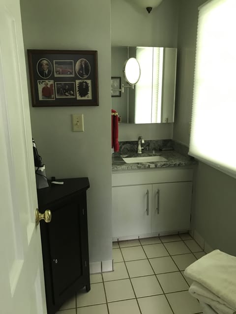 Combined shower/tub, hair dryer, towels, soap