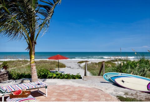 On the beach, sun loungers, beach towels