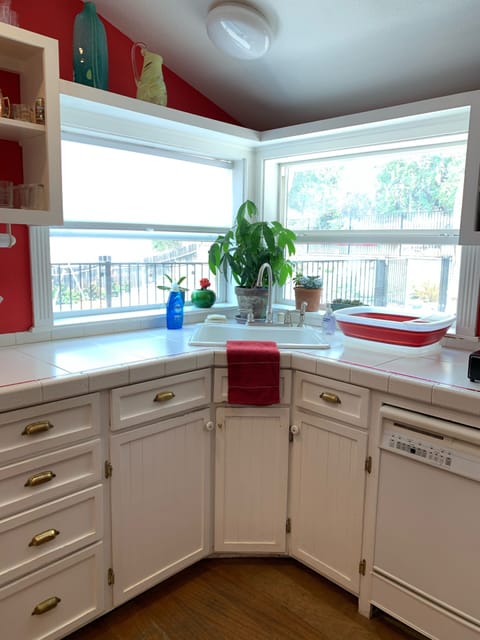 Farmhouse sink overlooking the pool