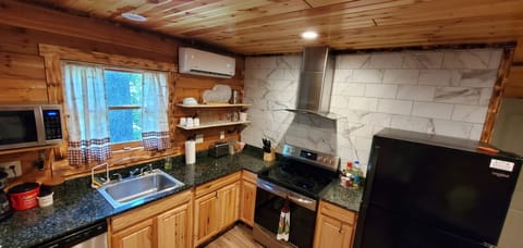 Well equipped kitchen with full size appliances.