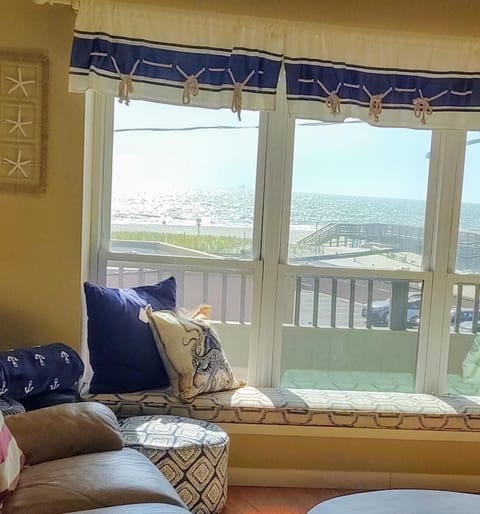 Window seat viewing the ocean.Watch the kite surfers and surfers year round! Fun