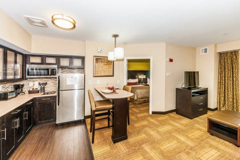 Enjoy a meal at the dining table.