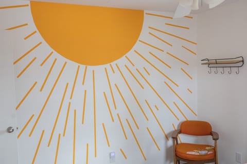 Mural in the second bedroom assures the sun will always be out at Willobee Pines