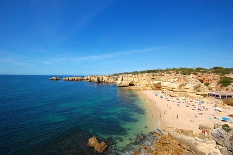 On the beach, sun loungers, beach towels