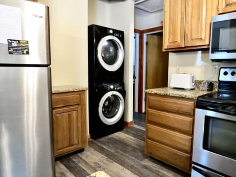 Washer & dryer right off the kitchen in case you need to do a load of laundry.