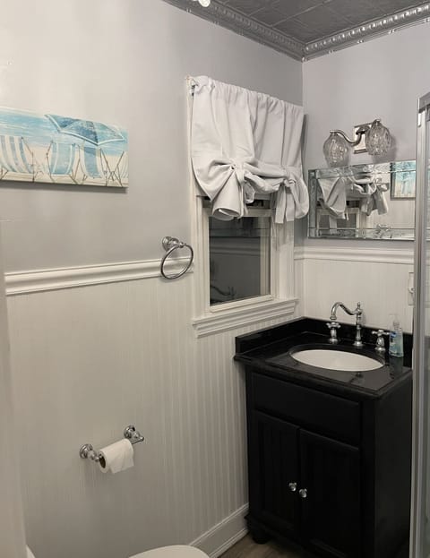 Combined shower/tub, hair dryer, towels, soap