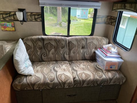 Couch - does fold down to make a bed, but very short