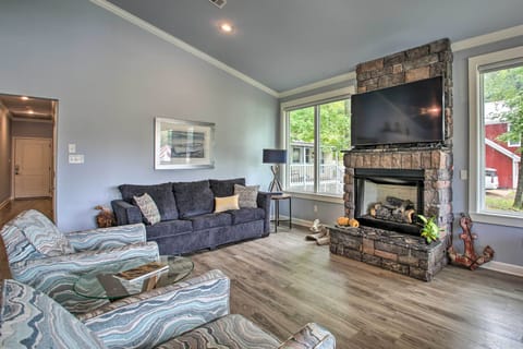 Sit back by the stone fireplace and watch a movie on the Smart TV!
