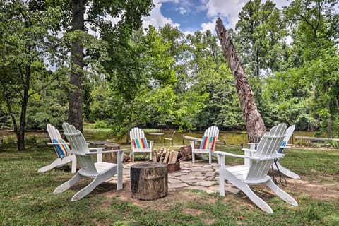 The vacation rental boasts a fire pit right on Little River.