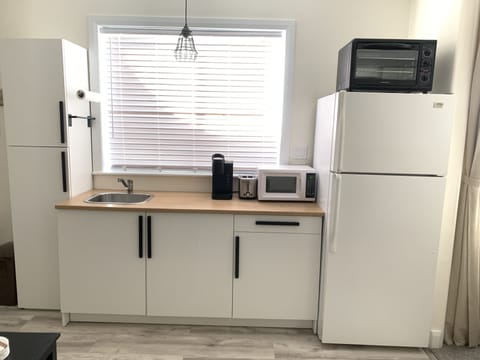 Fridge, microwave, coffee/tea maker, toaster