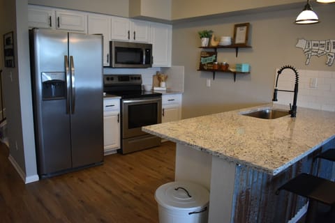 Fully loaded kitchen with stainless steel appliances
