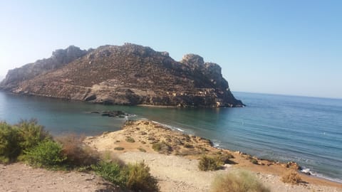 On the beach, sun loungers