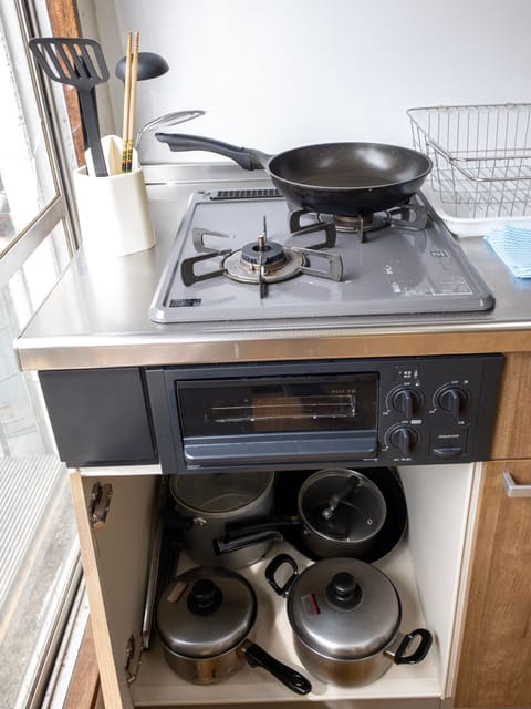 Fridge, microwave, stovetop, cookware/dishes/utensils