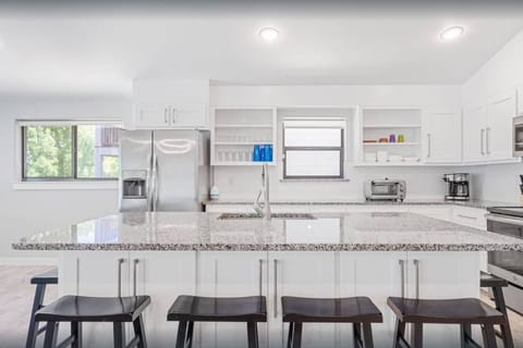Large kitchen island with seating area for 6+ people