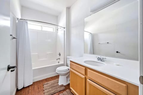 Combined shower/tub, hair dryer, towels, toilet paper