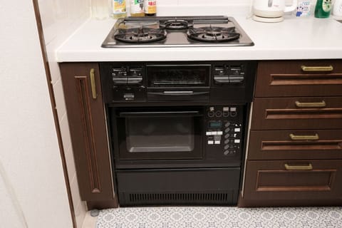 Fridge, microwave, cookware/dishes/utensils