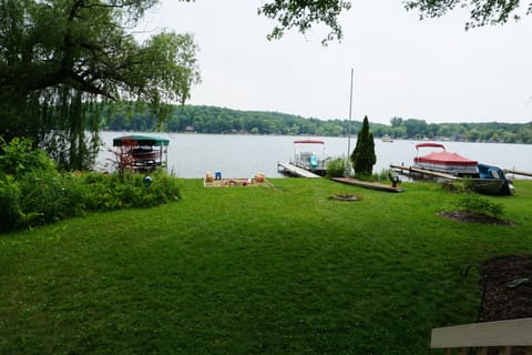 View from front deck of 10' x 10' sandbox and Sweezey Lake.