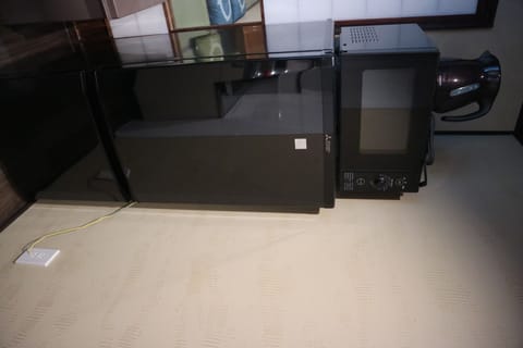 Fridge, microwave, stovetop, cookware/dishes/utensils