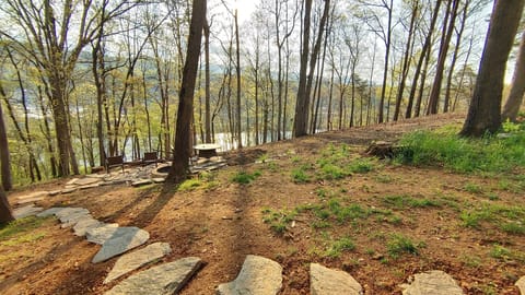 Flagstone path to firepit and views of the river and Riverside Dr.