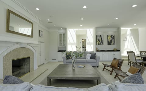 The great room is spacious with plenty of chairs and couches to lounge.