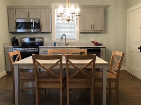 Our fully renovated kitchen features granite countertops.