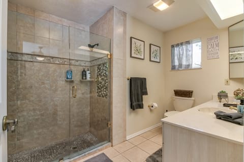 Combined shower/tub, hair dryer, towels, soap