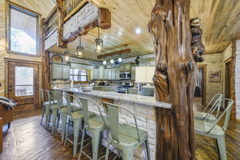 The living room flows seamlessly into the kitchen so you don't miss a moment.